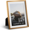 HAUS AND HUES 5x7 Picture Frame with Real Glass & Brass Premium-Grade Metal Matted to 4x6 - Aluminum 5x7 Picture Frame - Includes Easel Back, Hanging Kit - Ideal for Home, Office (5x7 in, Brass)