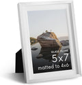 HAUS AND HUES 5x7 Picture Frame with Real Glass & White Premium-Grade Metal Matted to 4x6 - Aluminum 5x7 Photo Frame - Includes Easel Back, Hanging Kit - Ideal for Home, Office (5x7 in, White)