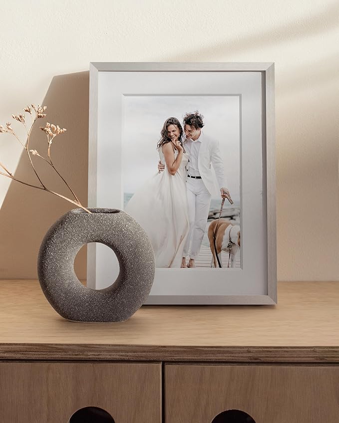 HAUS AND HUES 6x8 Picture Frame with Real Glass & Silver Premium-Grade Metal Matted to 4x6 - Aluminum 6x8 Picture Frame - Includes Easel Back, Hanging Kit - Ideal for Home, Office (6x8 in, Silver)