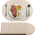 Placemats Set of 12 Washable, Heat Resistant Table Placemats Wipeable Faux Leather Oval Place Mats Non Slip, Waterproof Oval Table Mats for Indoor Outdoor, Beige